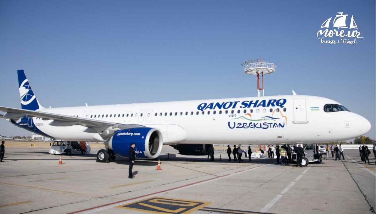 7 1 2 рейс. Qanot Sharq Airlines logo.